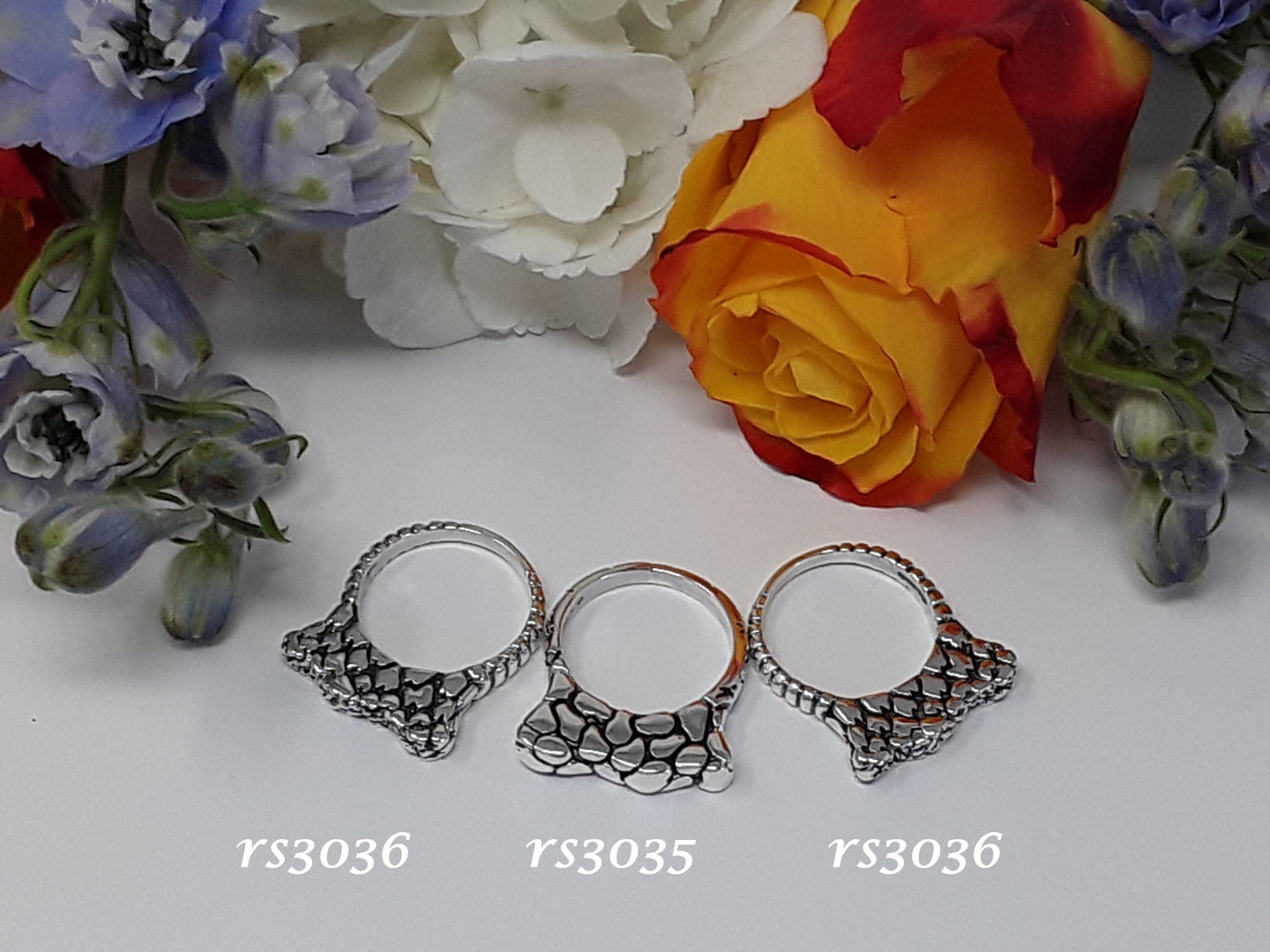 rs3035 - Sterling Silver Abstract Pear Star Stack Ring