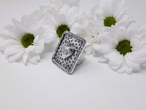 rs7920 - Large Square With Small X'S And Center Puffed Heart Ring
